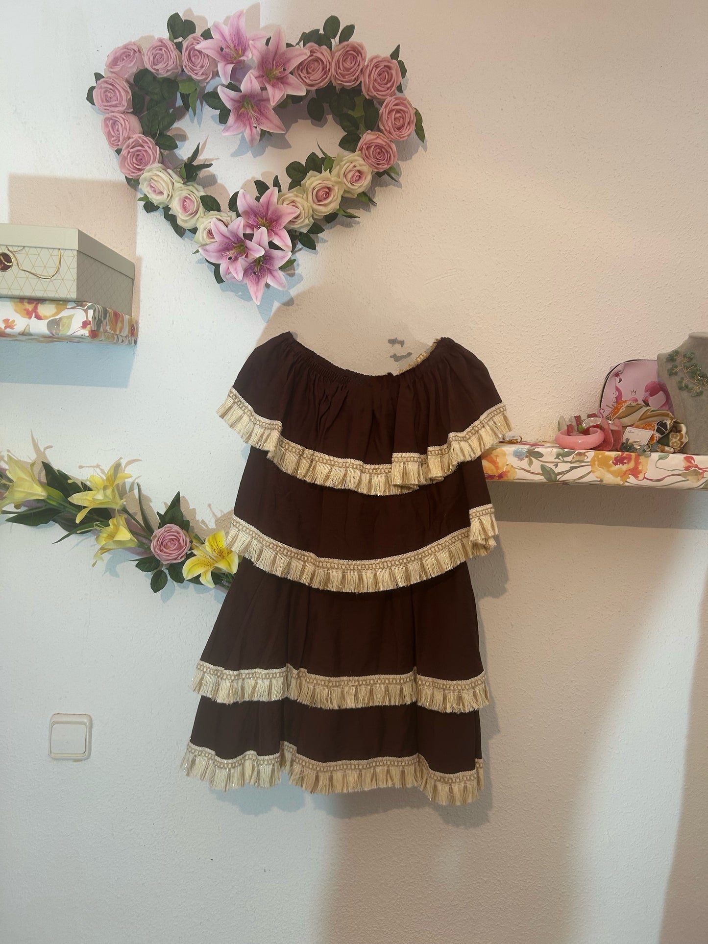 Conjunto flecos chocolate.