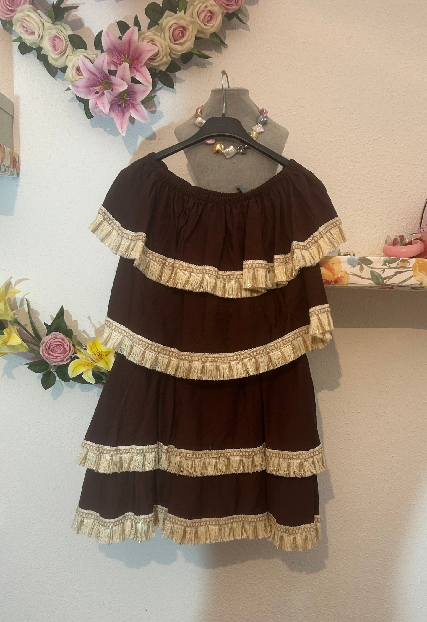 Conjunto flecos chocolate.